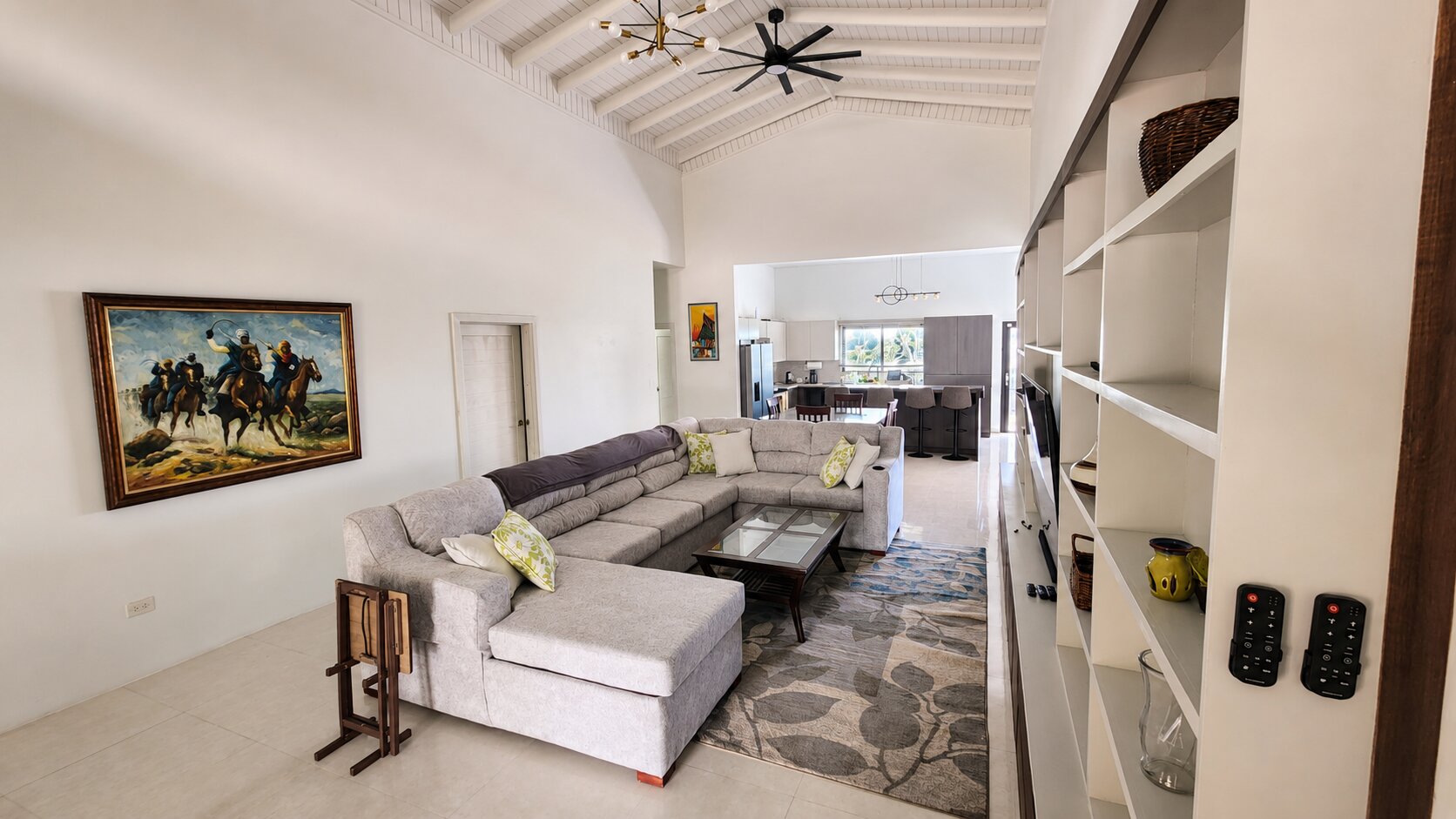 The open-plan living room and media wall from another angle